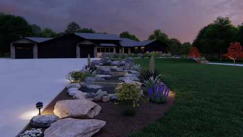 Front yard with decorative rock and garden bed